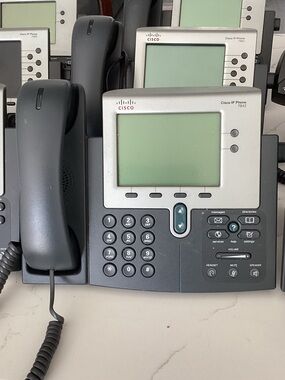 Cisco IP Phone 7942 in Black and Silver with Green Display read description
